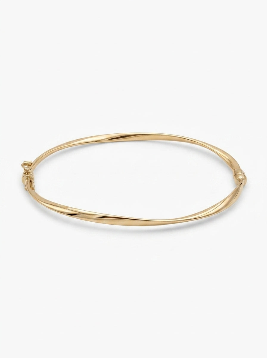 Brazalete de oro 14k hueco diseño torcido Mod 5570 - 18 cm