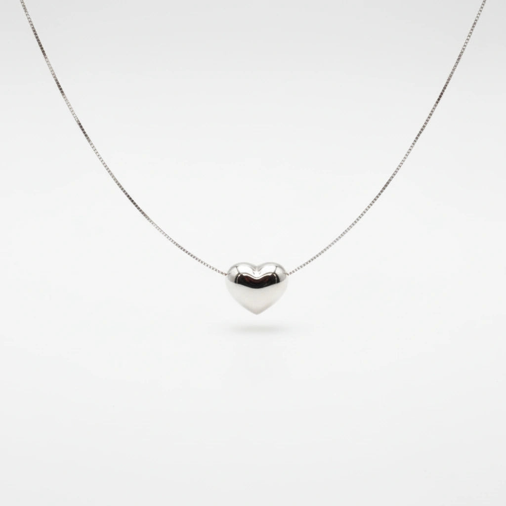 Gargantilla de corazón inflado en oro blanco 14k