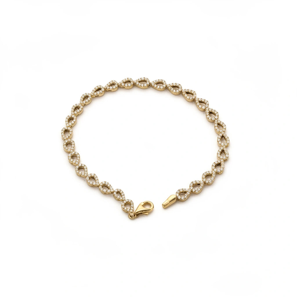Pulsera de oro 10k de silueta de gotas con incrustaciones de circonias