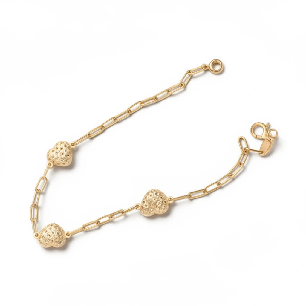 Pulsera de oro 10k con corazones biselados - 18 cm