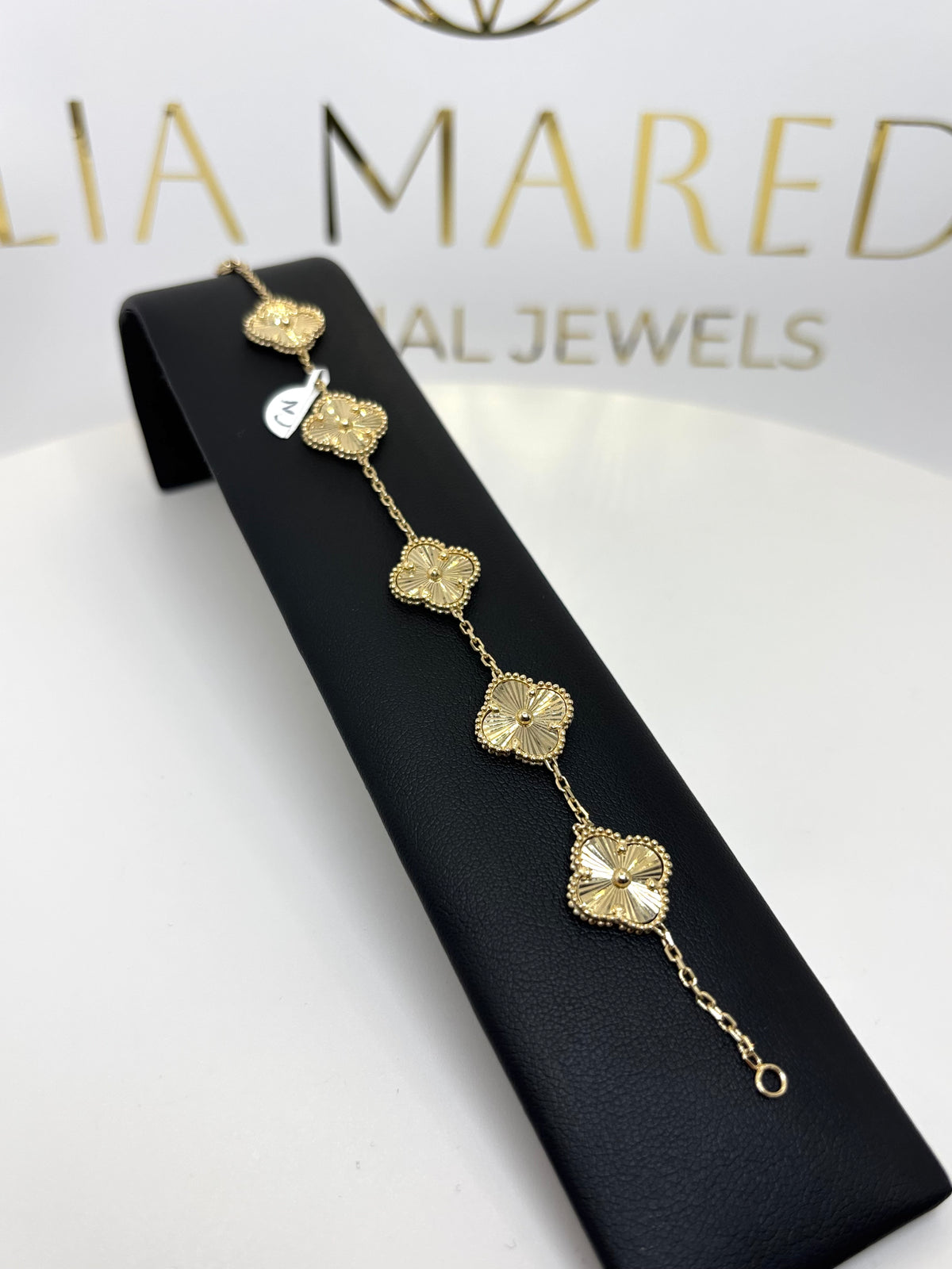 Pulsera de tréboles grandes doradas de oro 14k