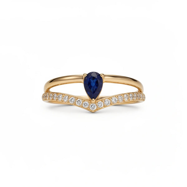 Anillo oro 10k con piedra azul corte pera y circonias