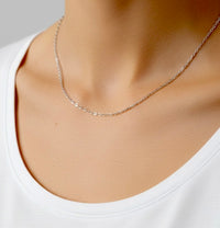 Cadena de oro blanco 14k tejido rolo 1 mm