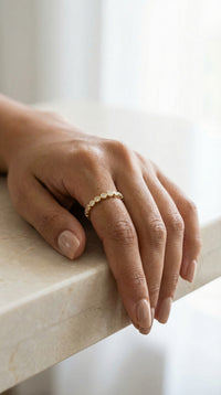 Anillo media churumbela de oro 14k con de bolitas de circonias