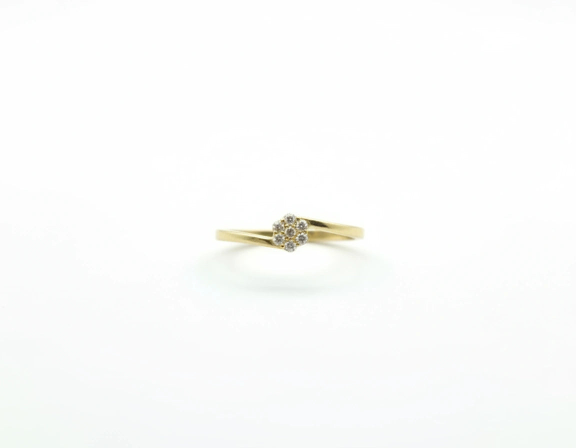 Anillo solitario de flor de oro 14k con circonias