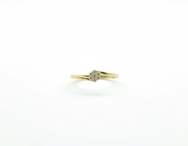 Anillo solitario de flor de oro 14k con circonias