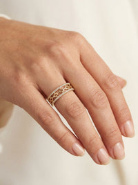 Anillo de oro 14k diseño historia entrelazada con circonias mod 5813