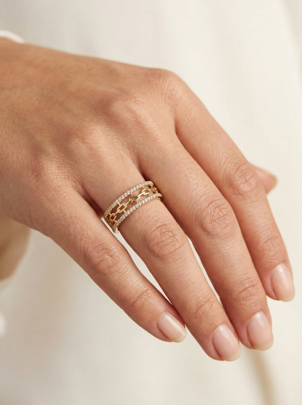 Anillo de oro 14k diseño historia entrelazada con circonias mod 5813