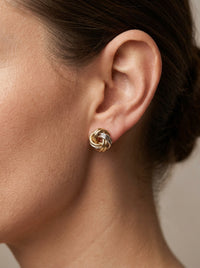 Aretes de oro 14k diseño de nudo bicolor Mod 5706
