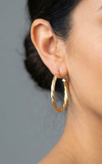 Arracadas torsales retorcidas de oro 14k Mod. L302