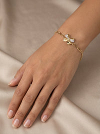Pulsera de oro 10k diseño de moño con eslabones  5922 - 18 cm