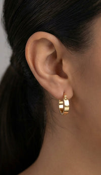 Arracadas pequeñas de diseñador de oro 14k