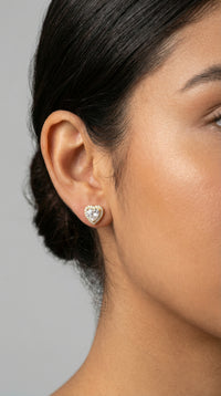 Aretes corazón de oro 14K con circonia central y halo
 Mod. 893