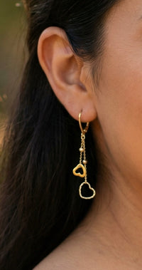 Aretes doble corazón de oro 14k