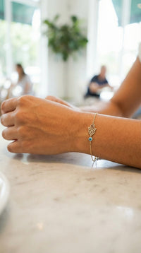 Pulsera de oro 14k de ojito turco y mano de Fátima Mod. 681130