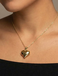 Dije de corazón inflado en oro 10k