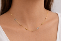 Gargantilla de bolitas de 3 oros 14k