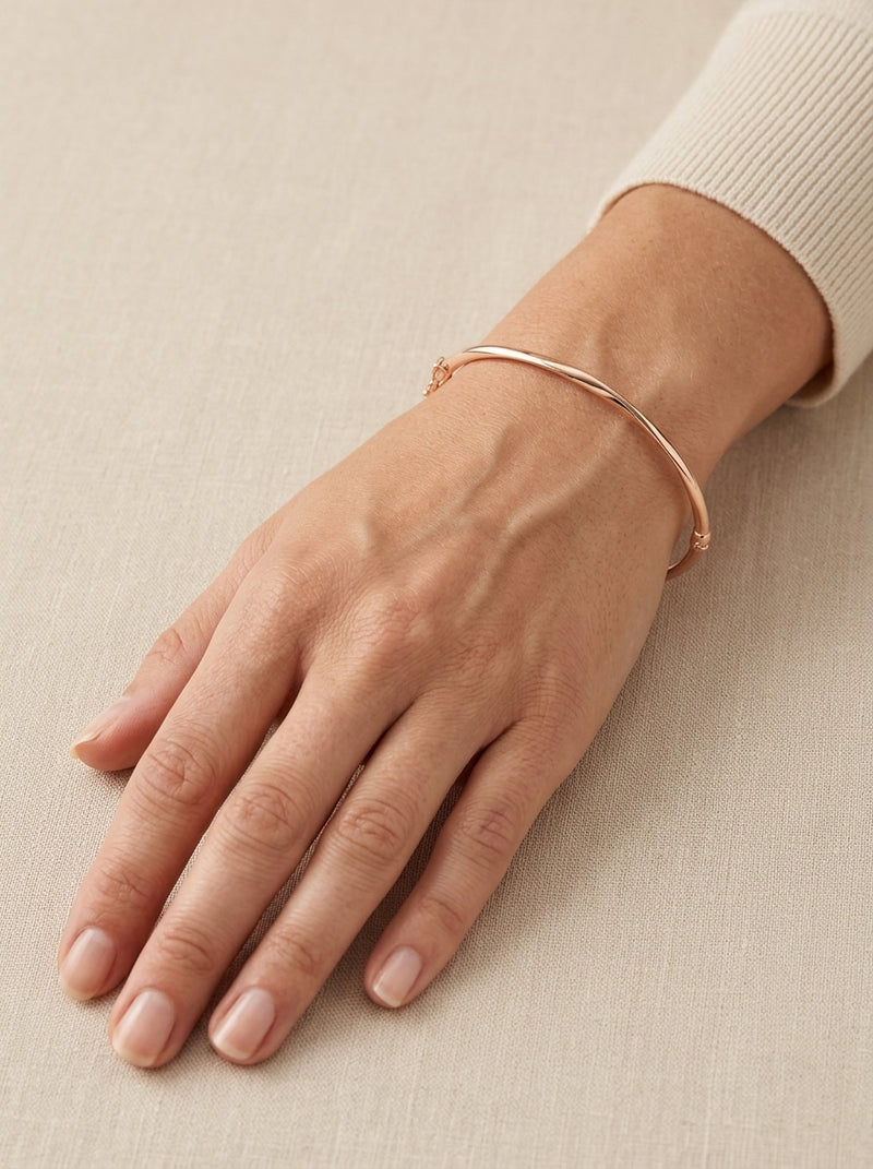 Brazalete de oro rosa 14k  hueco diseño torcido Mod 5571 - 18 cm