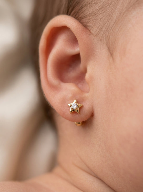 Broquel baby de oro 14k diseño de estrellas con diamantes naturales Mod 5444