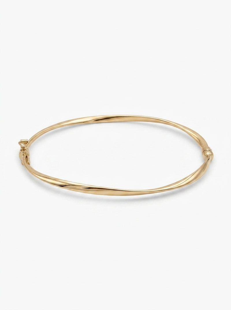Brazalete de oro 14k  hueco diseño torcido Mod 5570 - 18 cm
