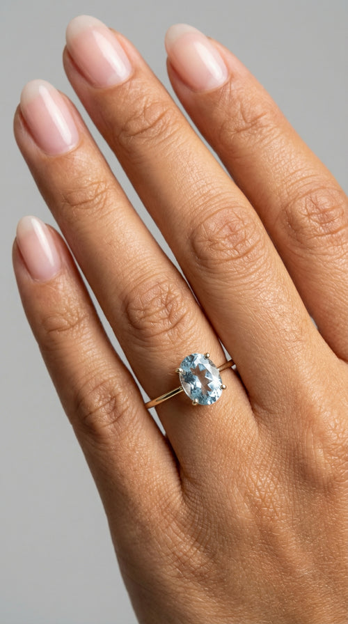 Anillo Solitario en oro 10k piedra Azul agua marina Oval