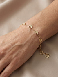 Pulsera de oro 10k diseño de clip con corazones Mod LM5176- 18 cm