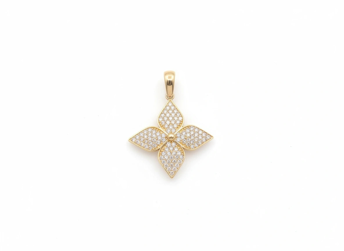 Dije flor con circonias en oro 14k