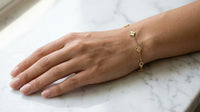 Pulsera de oro 14k de tréboles pequeños dorados de 18 cm x 8mm Mod. LM 5012