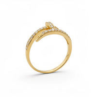 Anillo silueta de claro de oro 14k con incrustaciones de circonias