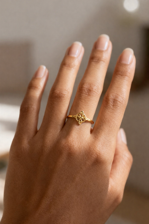 Anillo nudo de bruja de oro 10k