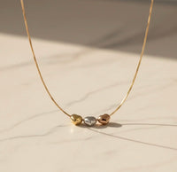 Gargantilla de corazones inflados de 3 oros 14k