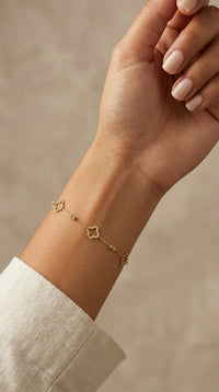 Pulsera de oro 10k silueta de tréboles con bolitas Mod. 041476 - 18 cm