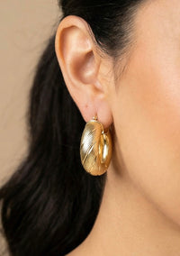 Arracadas modelo grabado italiano de oro 14k