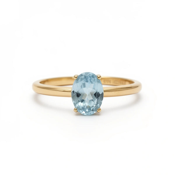 Anillo liso de oro 14k con circonia azul Mod 14001