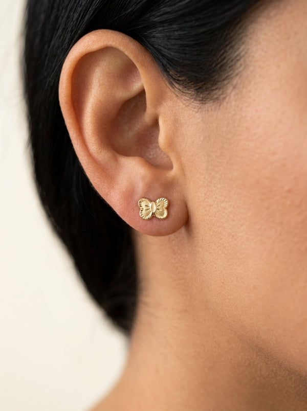 Broquel de oro 10k delgado diseño de moño diamantado y arenado (de bolitas) Mod 5662