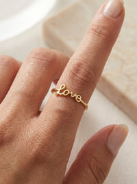 Anillo de oro 10k diseño love Mod 5533 - ajustable