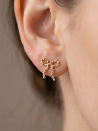 Aretes de oro 14k diseño de moño calado Mod LM5305
