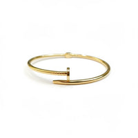 Brazalete de oro 10k tipo diseñador de clavo grueso liso semi hueco 18 cm