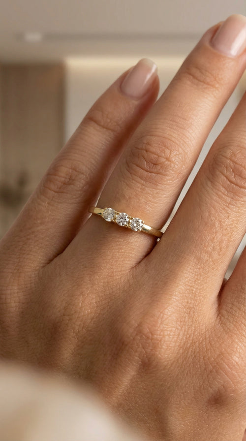 Anillo de oro 14k con 3 circonias