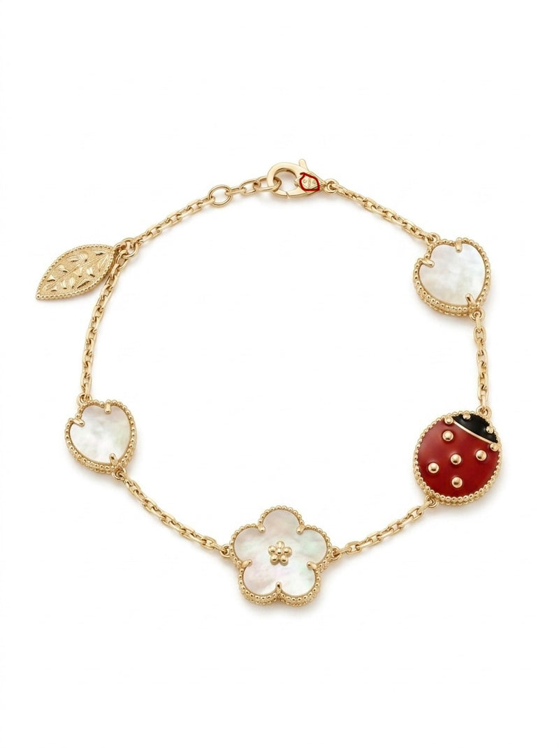 Pulsera de oro 10k tipo diseñador de catarina y flores madre perla Mod 5699 - 18 cm