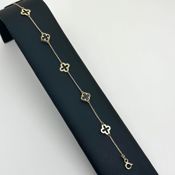 Pulsera calada de oro 14k con tréboles de ónix mod. 2470