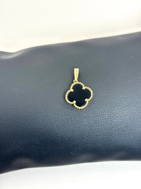 Dije de Flor Negra de oro 14k