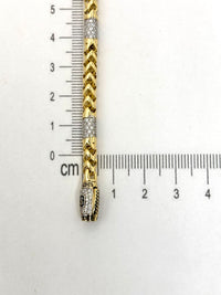 Pulso tipo espiga de oro 14k con incrustaciones de circonia