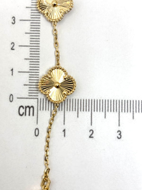 Pulso de flores grandes doradas de oro 14k