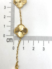 Pulsera de tréboles  grandes doradas de oro 14k