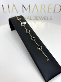 Pulsera de treboles de oro 14k negras medianas con piedra onix