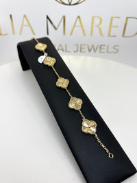Pulsera de tréboles  grandes doradas de oro 14k