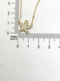 Gargantilla de estrella de mar de oro 14k