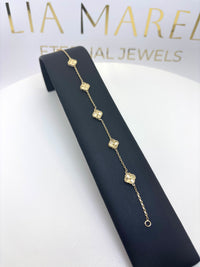 Pulsera de tréboles pequeños dorados de oro 14k