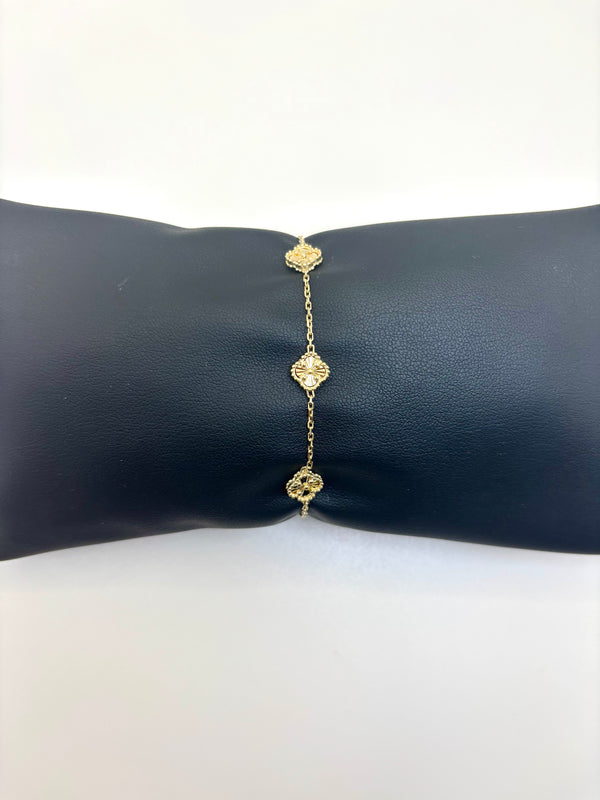 Pulsera de tréboles pequeños dorados de oro 14k